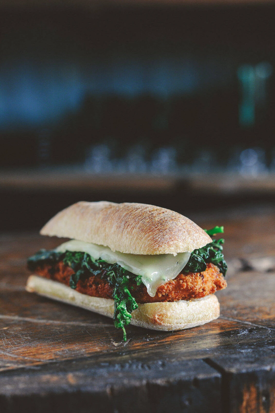 A cutlet sandwich with broccoli rabe and sharp provolone from Sassano’s